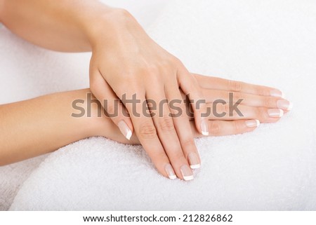 Hands on towel - Manicure, nails with french