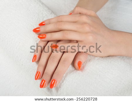 Hands on towel - Manicure, red color