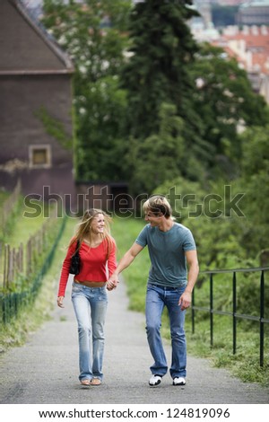 Young couple walking in countryside