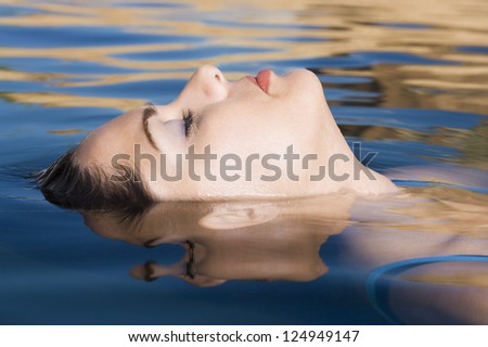 Closeup of woman\'s face in sea water
