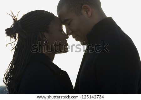 Young african american couple rubbing noses