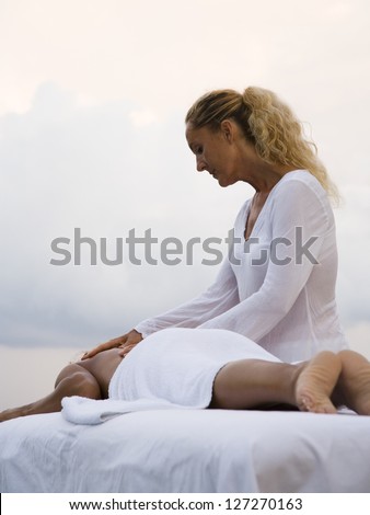 Woman getting a massage from a message therapist,Costa Rica
