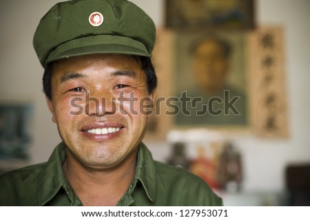 Man in military uniform smiling