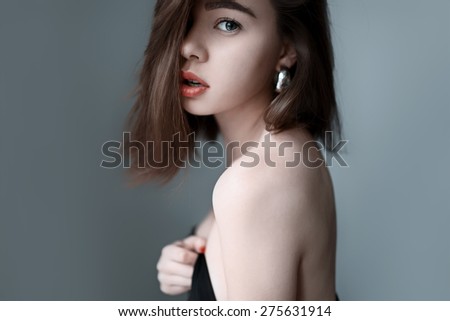 Portrait of beautiful girl in profile with red lips