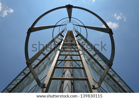 Fire escape ladder on a building, iron staircase