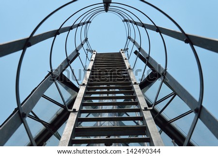 Fire escape ladder on a building, iron staircase