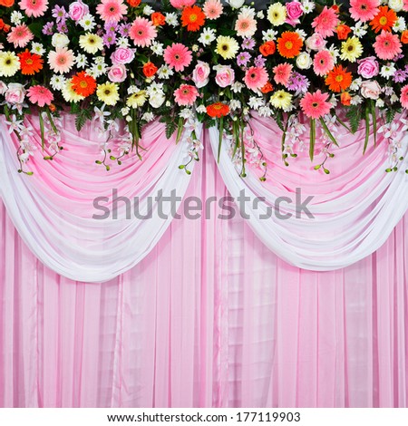 wedding scene, beautiful background made from fabric and flowers decoration in wedding ceremony