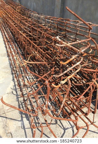 Steel rods used to reinforce concrete in construction site