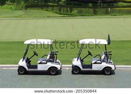 golf car in green golf course