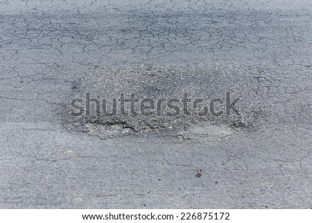 asphalt black road empty with repair damaged road