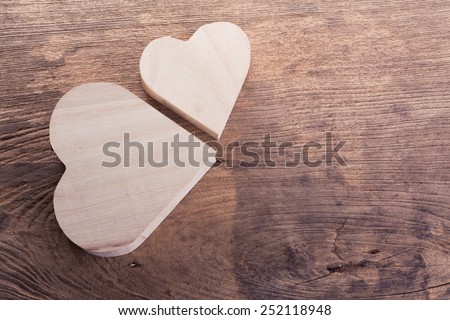 heart brown wood box on wood background, abstract love background
