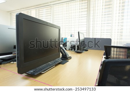 table work in office with black computer pc