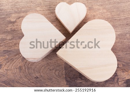 heart brown wood box on wood background, abstract love background