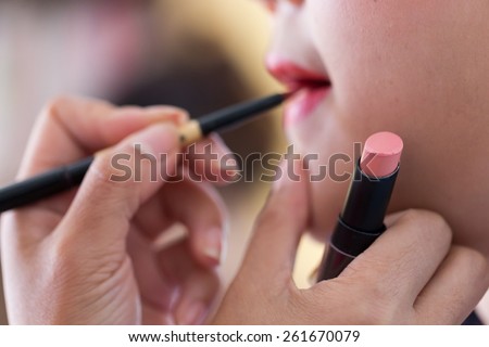red lipstick of makeup with cosmetic for woman