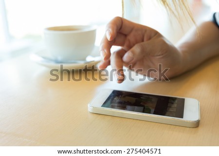 lifestyle of women using a mobile phone in cafe coffee shop