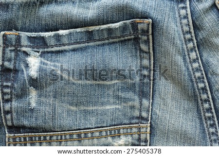 back pocket of fashion blue jeans