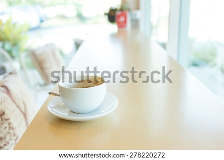hot of coffee drink on wooden table bar in the cafe