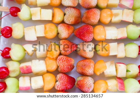 fruit salad with strawberry apple and cantaloupe