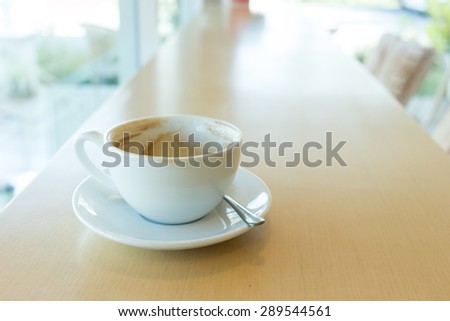 hot of coffee drink on wooden table bar in the cafe