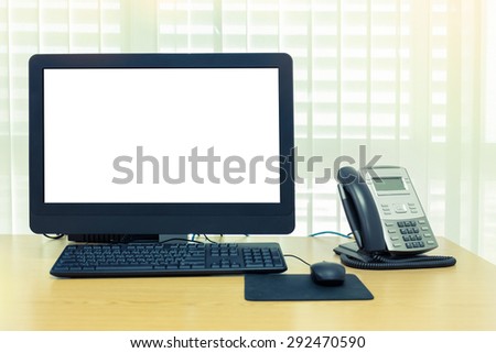 telephone and computer on table work of room service office