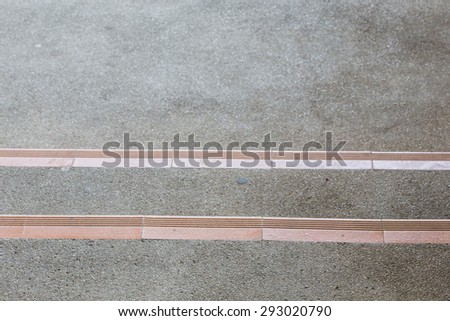 stairway made from sand and small gravel stone washed floor