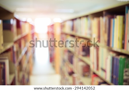 books on bookshelf in library, abstract blur defocused background