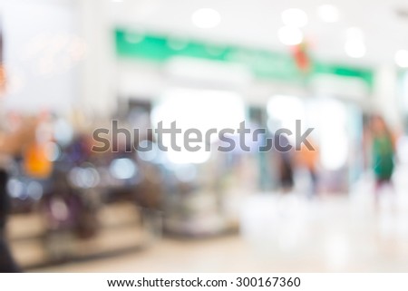 abstract blurred light of department store shopping center defocused background