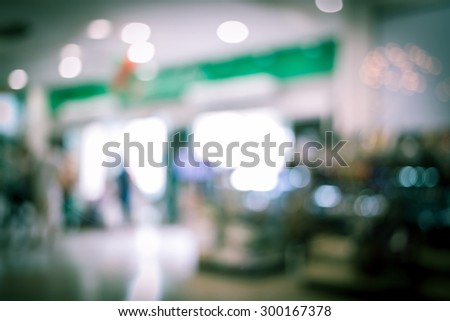 abstract blurred light of department store shopping center defocused background