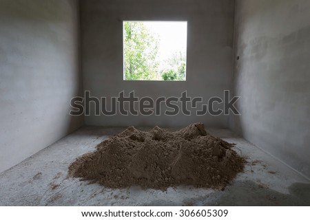 pile sand in construction site prepared mix cement concrete for plaster wall and floor