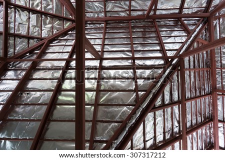roof with steel beam and silver foil insulation heat on ceiling roof house