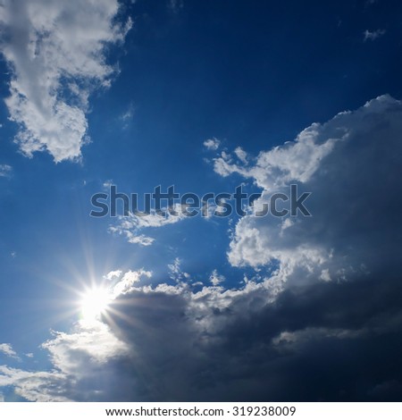 clear weather sky, sun on blue sky with clouds, sun rays, solar of clean energy power