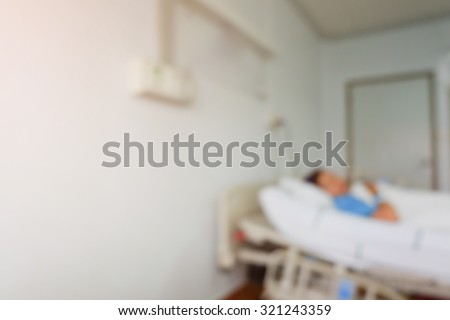 patient sleep on bed, image blur hospital background