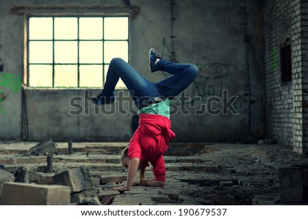 Teenager dancing in the old brickworks
