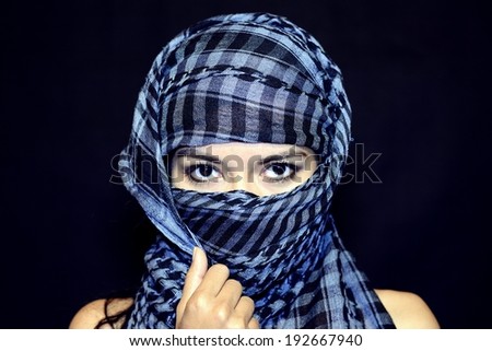 Beautiful girl in plaid scarf