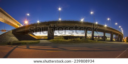 Extreme wide shot of curvy bridge at twilight in Richmond, BC, Canada