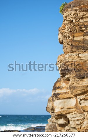 Rock face at the beach in the afternoon at Point Cartwright - Sunshine Coast - QLD.