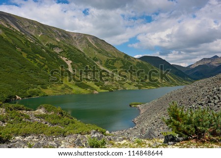 The lake in mountains of the central Kamchatka in Russia in the summer