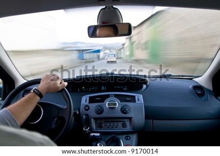 Car driver chasing a van at high speed.