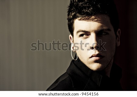 Young model performing security agent in the darkness