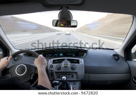 stock photo Inside car view at high speed