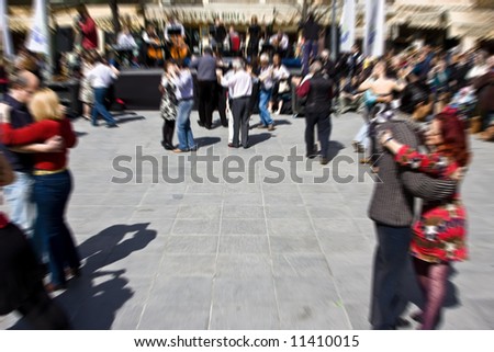 Couples dancing in tango street festival