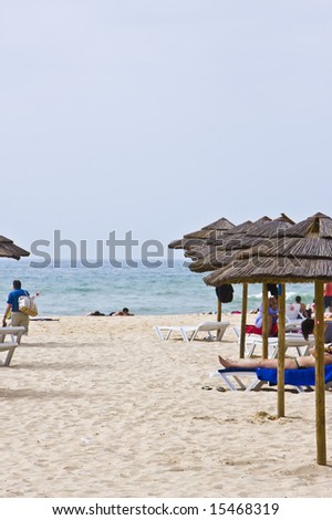 Beach umbrellas in beautiful clean sand.