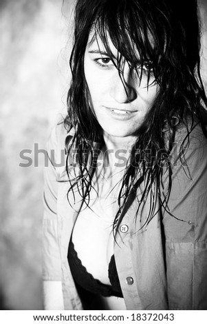 Sensual woman portrait with her hair wet.