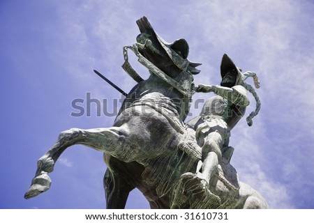 stock photo : Pizarro statue over the blue sky.
