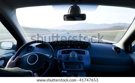 stock photo Inside car view at high speed