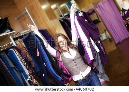 Young beautiful woman in a fashion shop