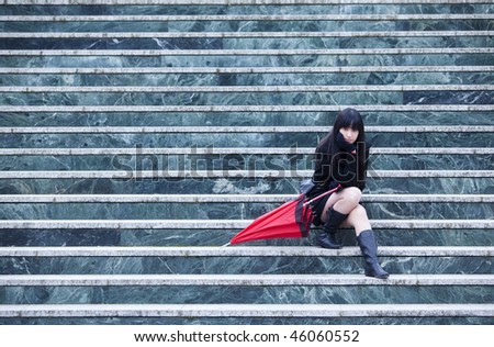 Young beautiful girl over steps pattern