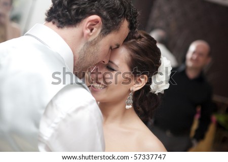 Bride and groom dancing on their wedding