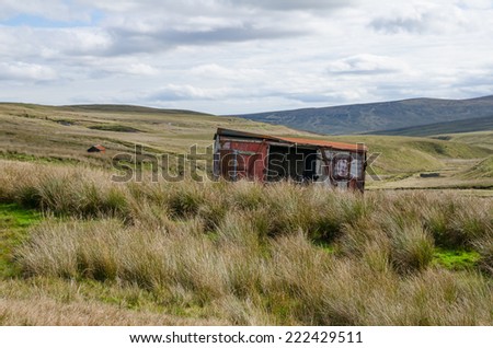 An old railway van used as a sheep shelter