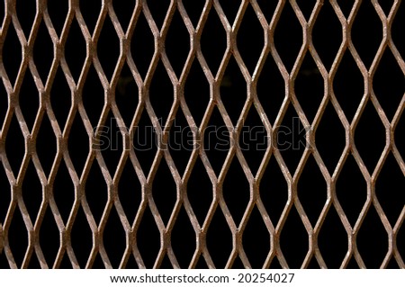 rust Metallic fence with black background